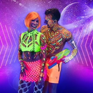 Desire Riviera Maya Theme Nights Couple with Desire Resort Sensual Galactic Theme Night Outfits