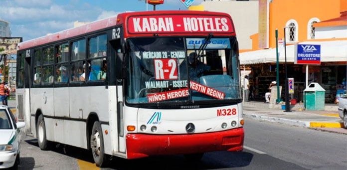 R2 city bus marked Mercado 28 and Centro in Downtown Cancun