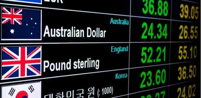 Currency exchange-rate board showing Mexican pesos and foreign currencies