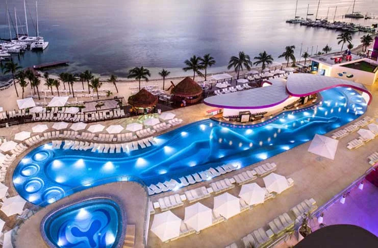 Temptation Cancun Resort pool overlooking the beach