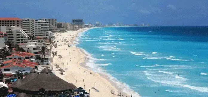 Cancun’s sandy shoreline and beachfront hotels