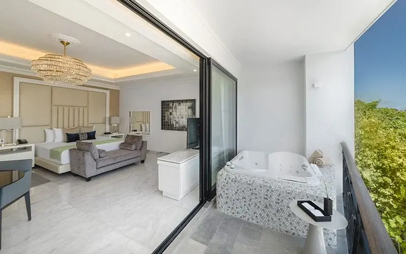 Terrace and outdoor tub in a Desire Mansion Royal Suite
