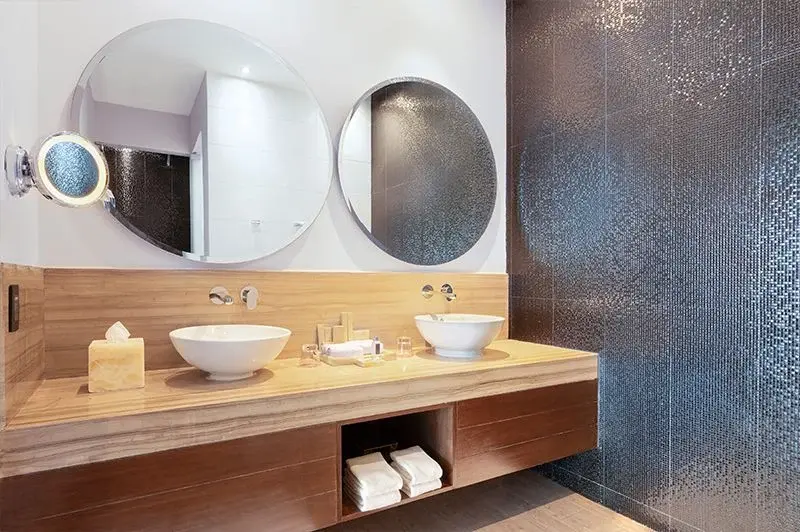 Dual-sink bathroom vanity in a Desire suite