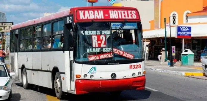 R2 city bus marked Mercado 28 and Centro in Downtown Cancun