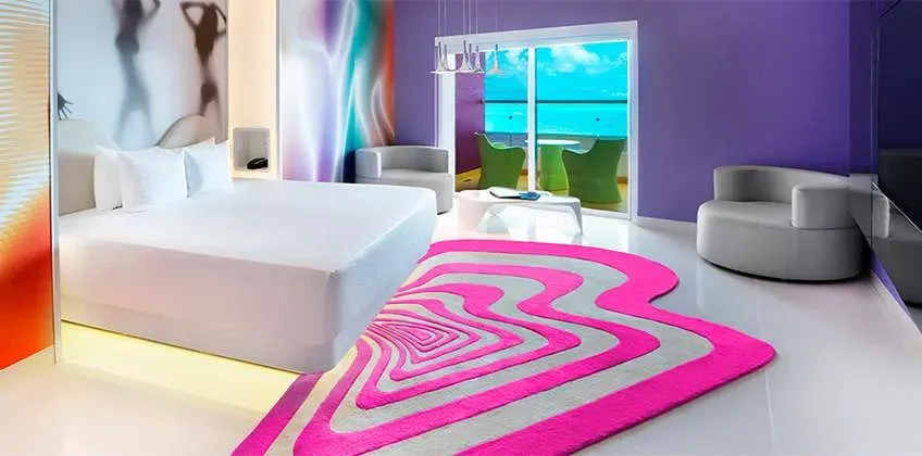 Lush Tower Oceanfront Suite with balcony at Temptation Cancun Resort