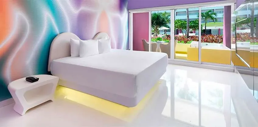 Plush Jacuzzi Room overlooking the Quiet Pool at Temptation Cancun Resort