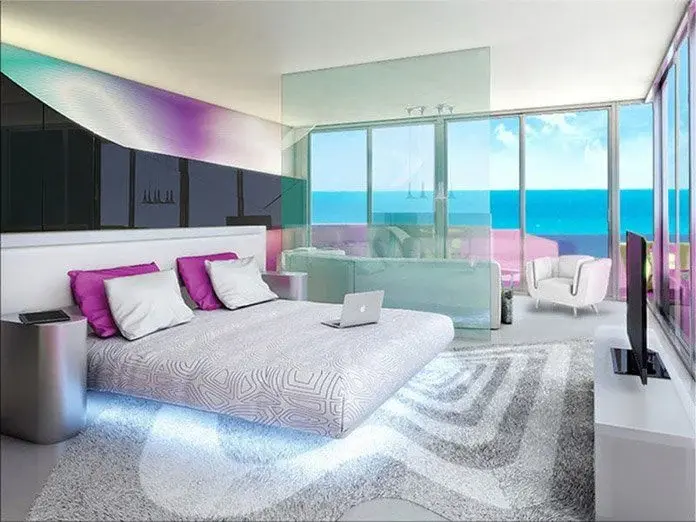 2017 design rendering of an ocean-view suite bedroom