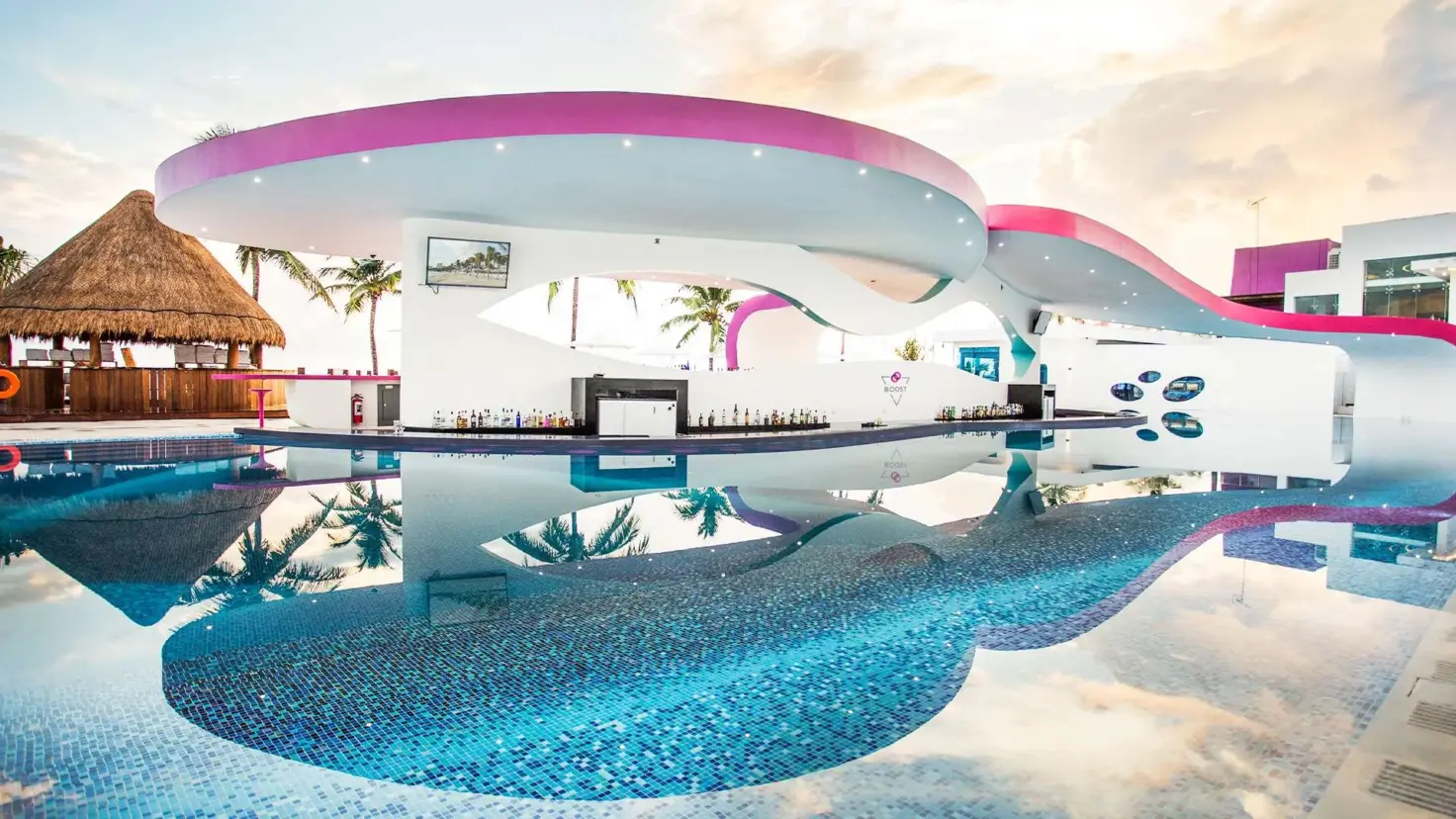 The Sexy Pool and curved poolside canopy at Temptation Cancun Resort