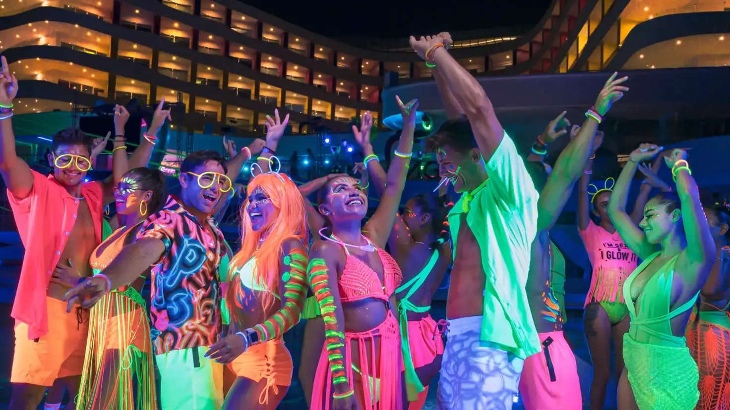 Models dancing at a theme-night party at Temptation Cancun Resort