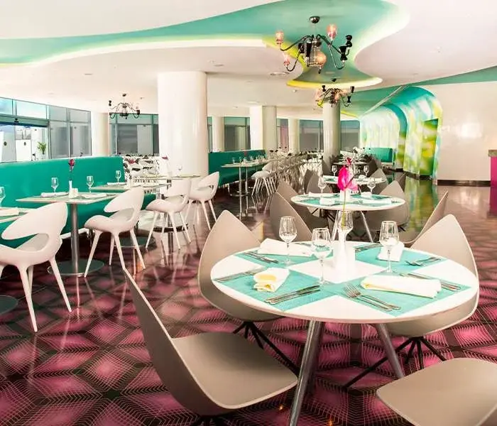 Dining tables inside Rain international buffet at Temptation Cancun Resort