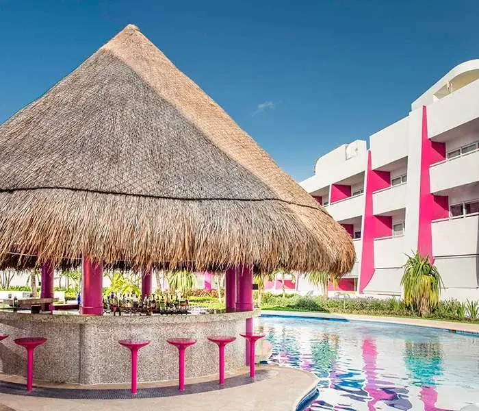 Zilanzio thatched swim-up bar beside the Quiet Pool at Temptation Cancun Resort