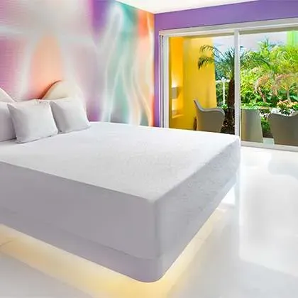 Trendy Garden View room opening toward the gardens at Temptation Cancun Resort