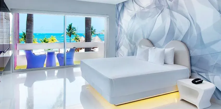 Trendy Ocean View room with a balcony view at Temptation Cancun Resort