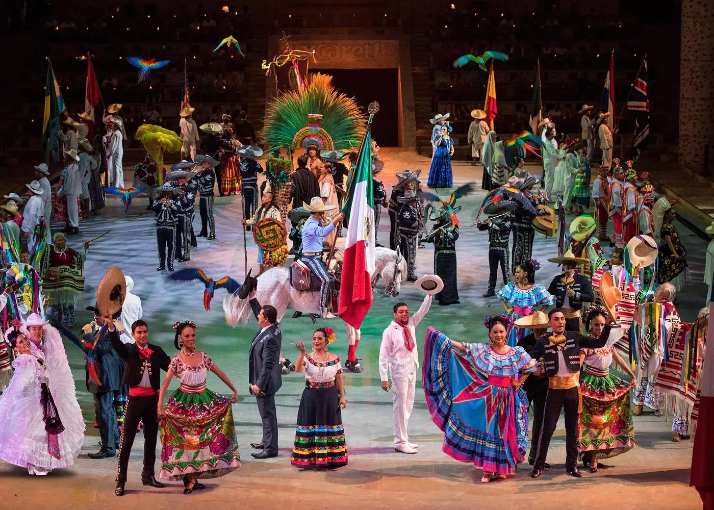 Performers in colorful dress during Xcaret México Espectacular