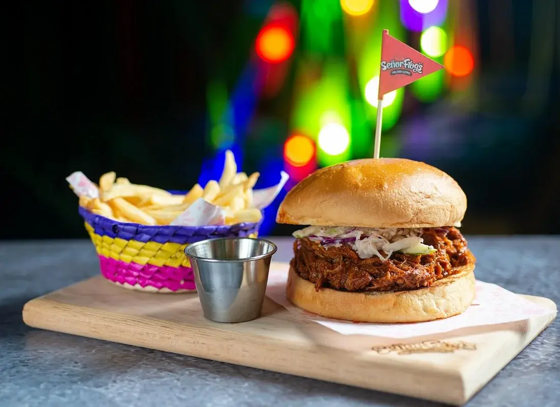 Burger and fries served at Señor Frog’s Cancun
