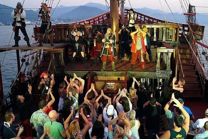 Guests joining the Captain Hook pirate show aboard the galleon